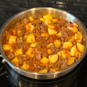 vegan goulash with potatoes and steak